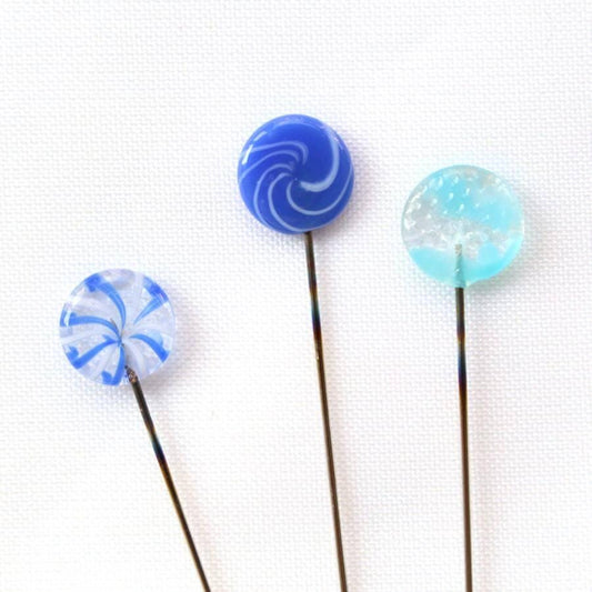 three lollipops sitting on top of each other