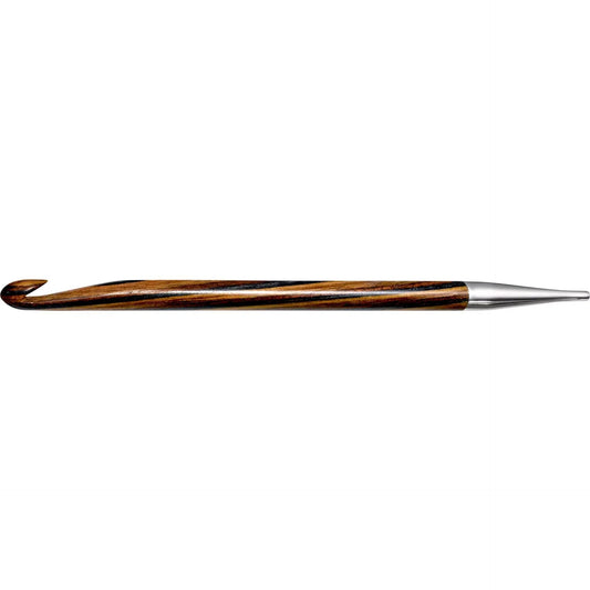 A wooden crochet hook with a silver tip is shown against a white background.