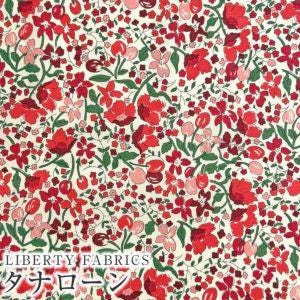 The image is a collage of various red and green floral patterns, creating a vibrant and visually appealing design.