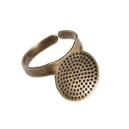 A round, perforated metal ring with a hole pattern.