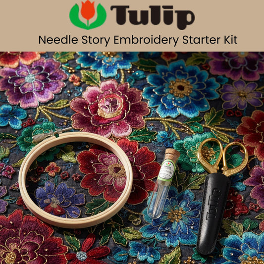 a needle story embroidery starter kit, including a hoop, a needle, and a small bottle of thread, all set against a background of colorful floral embroidery.