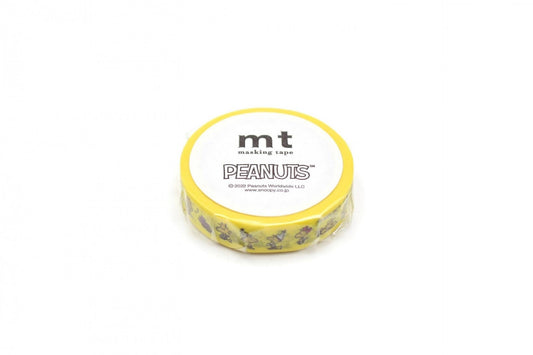 A yellow and white circular object with the text "Peanuts" printed on it.