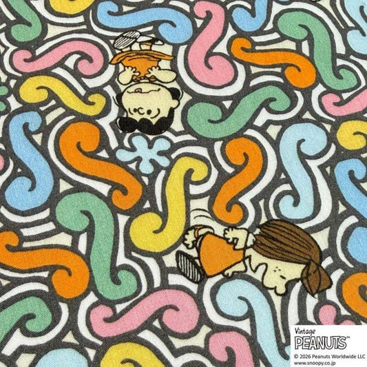 The image is a vibrant and colorful pattern featuring cartoon characters, including Peanuts, in various poses and expressions.
