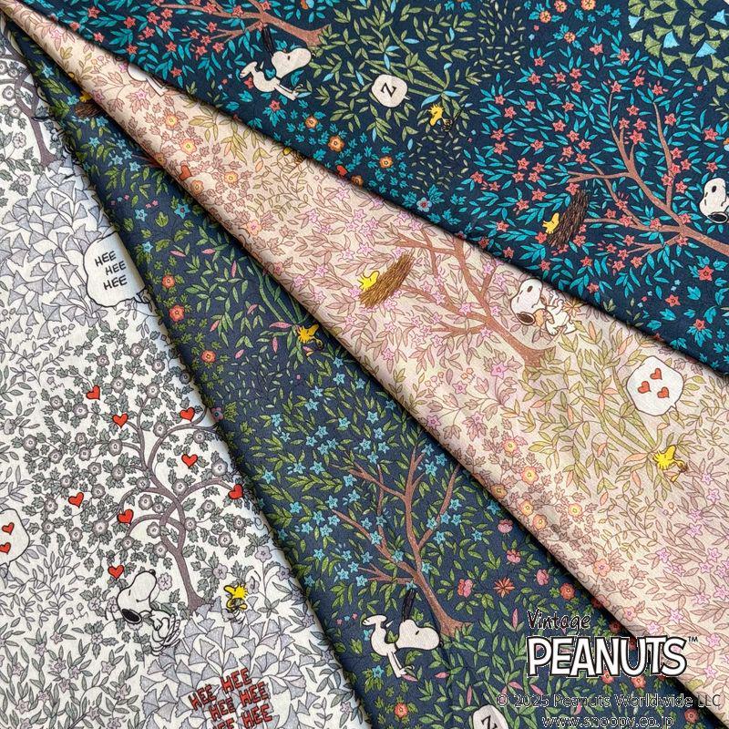 The image is a collage of fabric swatches featuring various patterns and designs, including a tree motif with Snoopy and other characters.