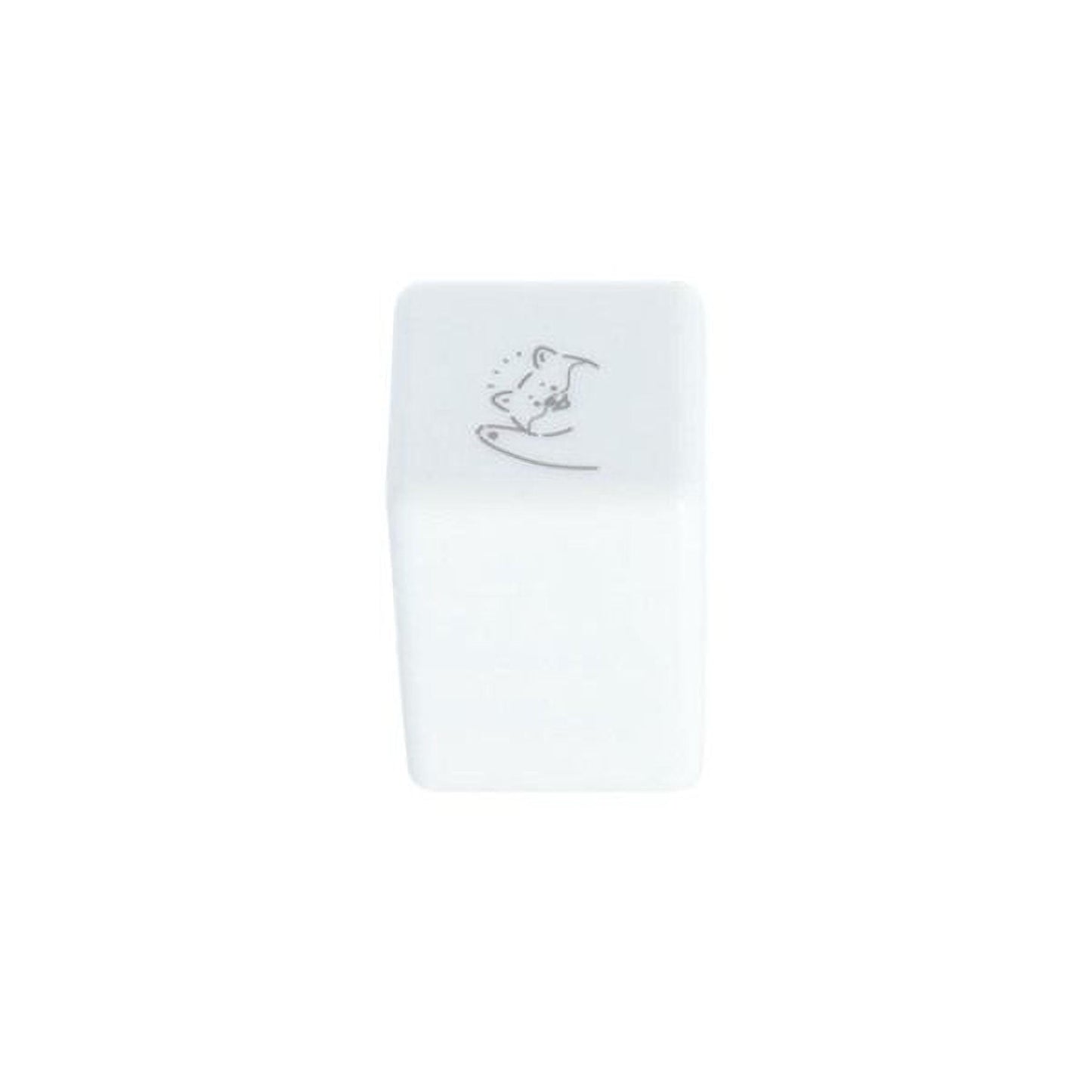 A white rectangular object with a small drawing or symbol on it.