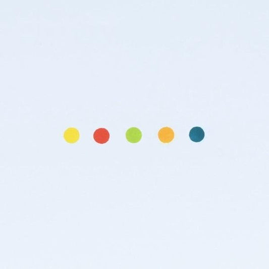 A row of five colorful dots against a light blue background.
