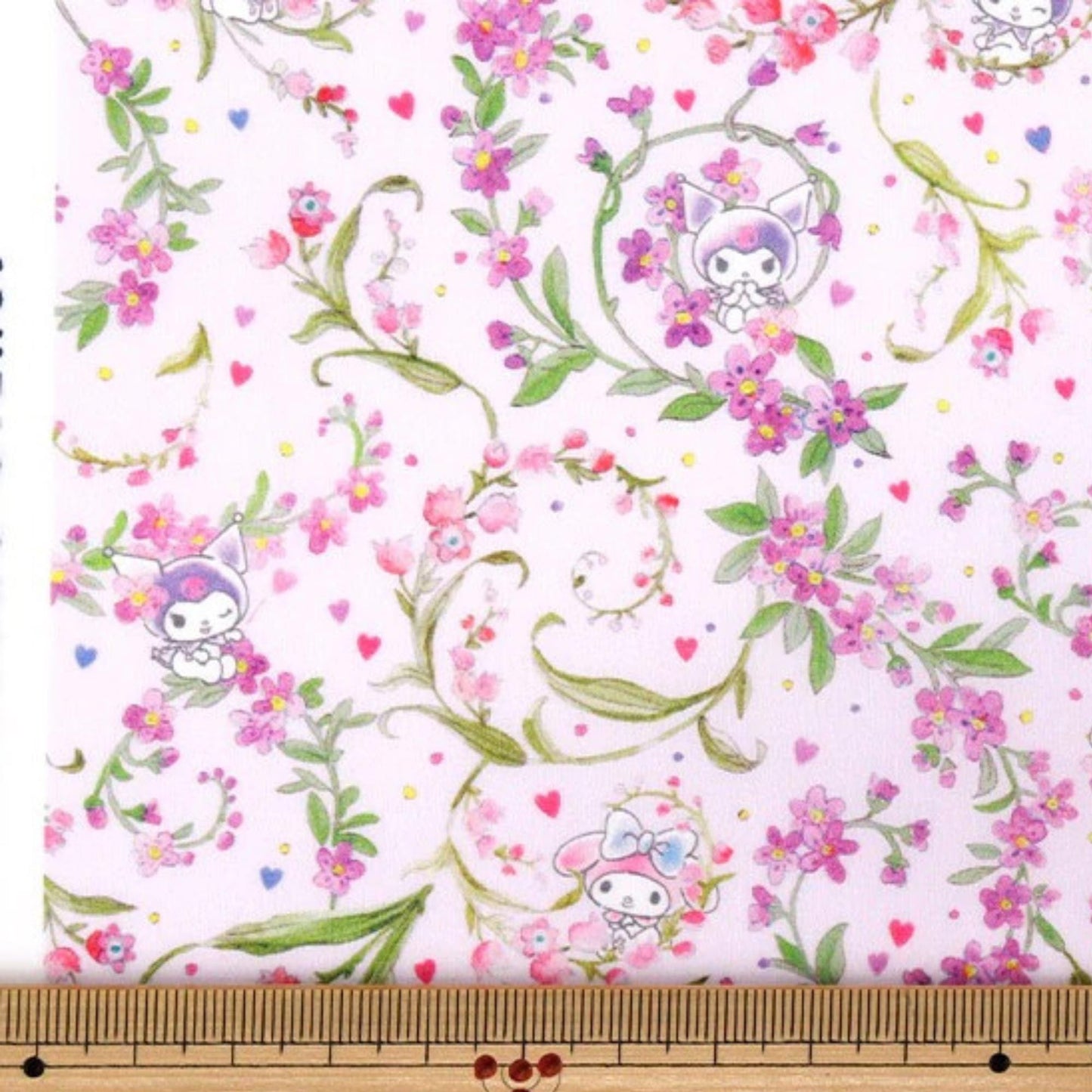 a repeating floral pattern with pink flowers and green leaves, along with small cartoon-like characters.