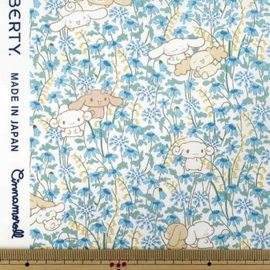 a pattern of cartoon-style animals, including rabbits and dogs, set against a background of blue flowers. The pattern is designed in a playful and whimsical style, with the animals and flowers arranged in a visually appealing manner.