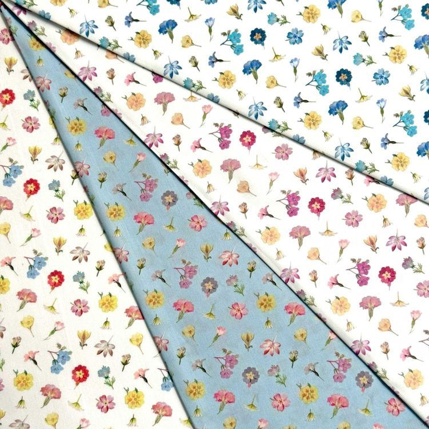 The image is a collage of various fabric swatches with different floral patterns, including blue, white, and pastel-colored flowers.