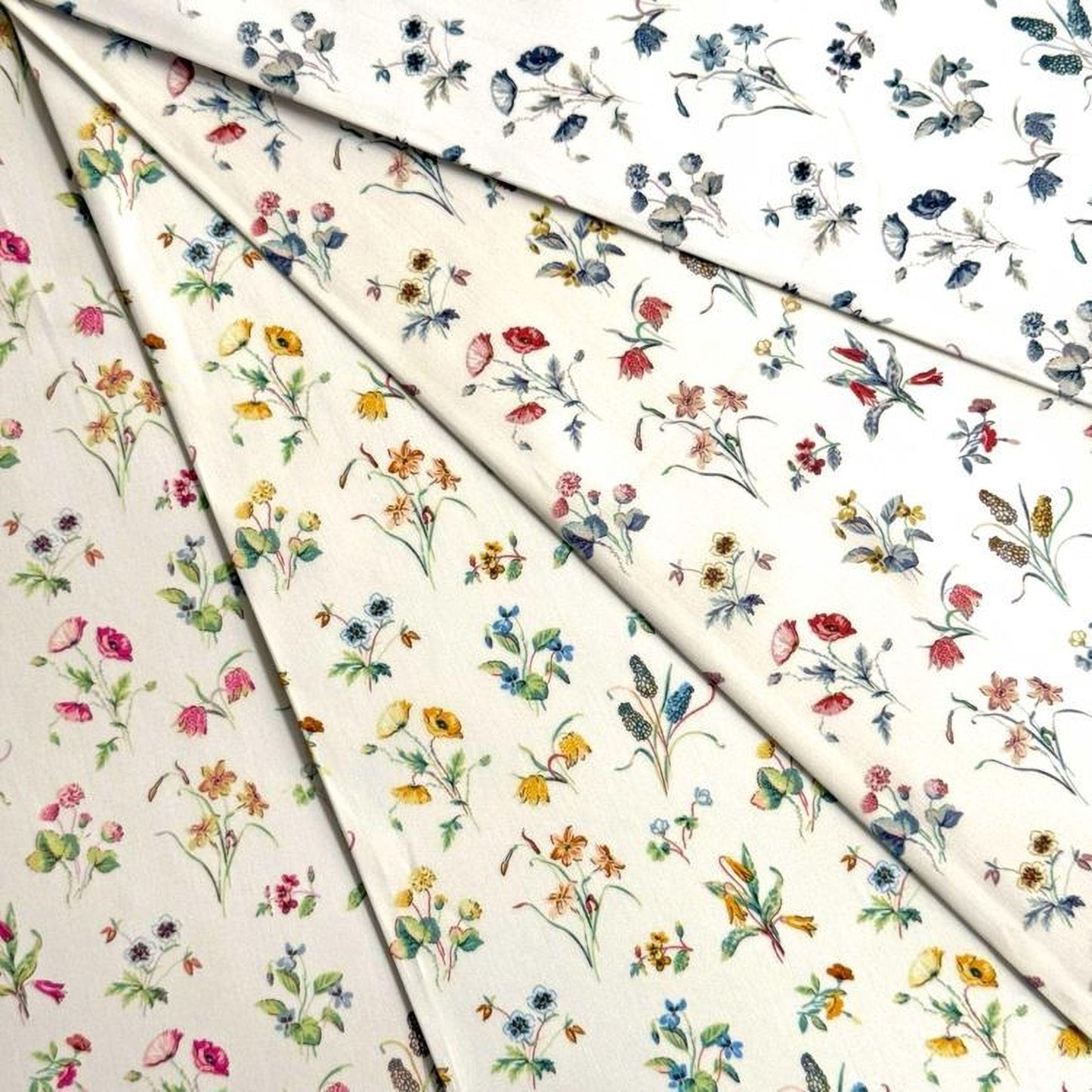 The image is a collage of various floral patterns, including different types of flowers and leaves, arranged in a visually appealing manner.
