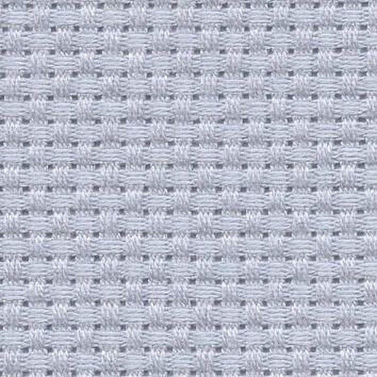 a close-up view of a fabric with a woven pattern, featuring small squares or rectangles arranged in a grid-like pattern.