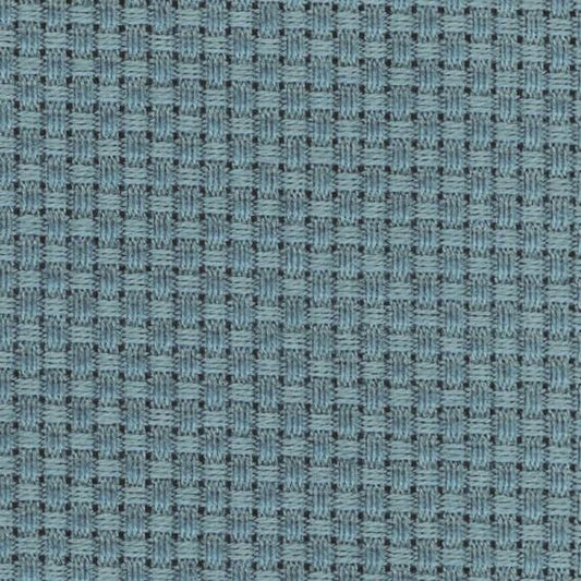 a close-up view of a fabric with a woven pattern in shades of blue. The fabric appears to be made of a material with a grid-like texture, creating a visually interesting and textured appearance.