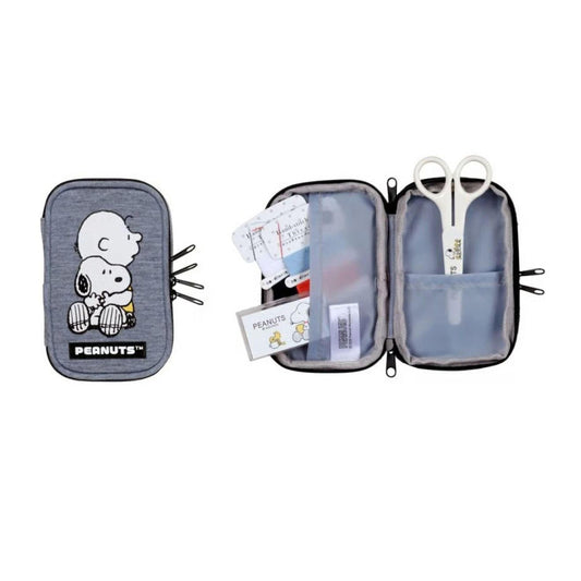 a gray pencil case with a cartoon character on it, containing a pair of scissors and other items.