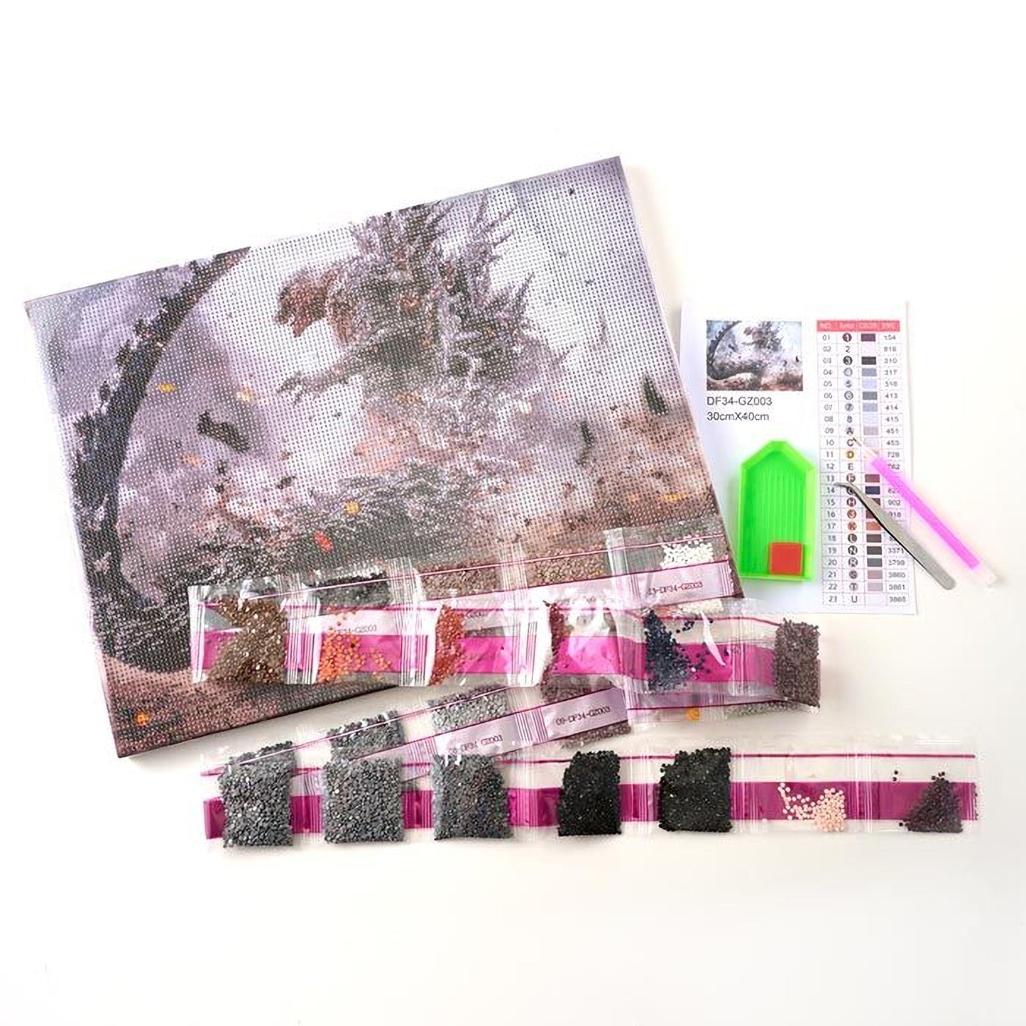 a large diamond-patterned canvas, a set of diamond-patterned paper, and various diamond-patterned items such as beads and a green tool.