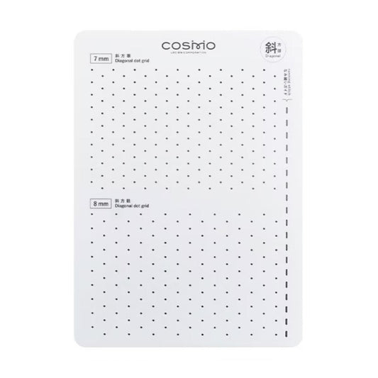 The image is a white rectangular grid with black dots, which appears to be a tool or device designed for measuring or marking purposes.