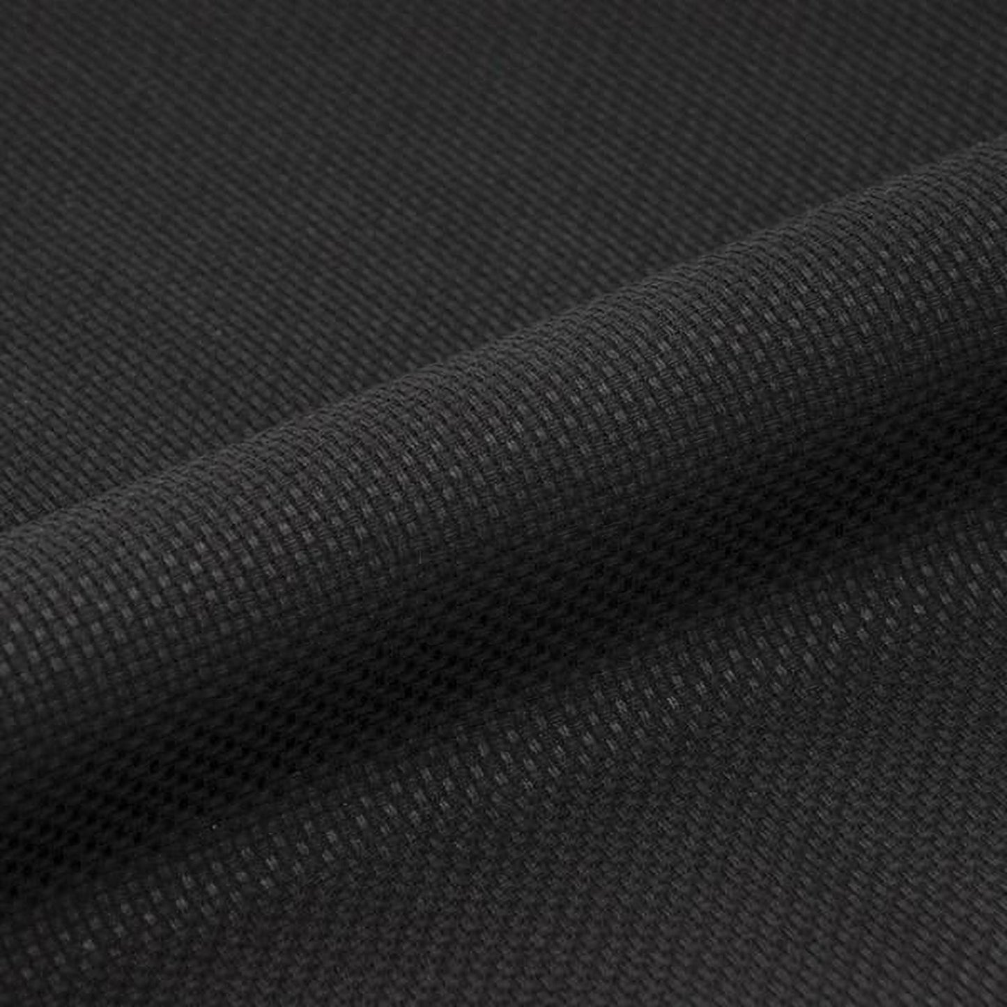 A close-up view of a black fabric with a textured, woven pattern.