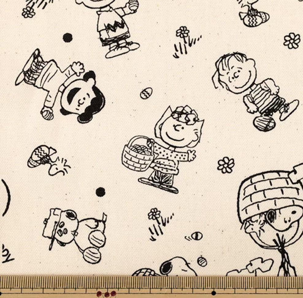 a collage of various cartoon characters, including Peanuts, drawn in black and white. The characters are scattered across the image, creating a playful and whimsical scene.