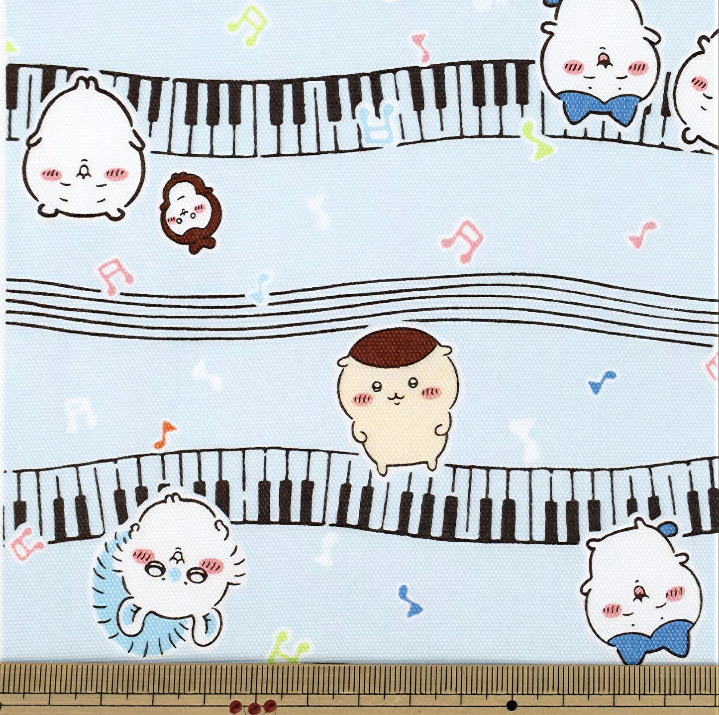 a playful and whimsical scene with a variety of cartoon animal characters, including a cat, a dog, and a bird, all interacting with musical instruments such as a piano keyboard and a drum set. The characters are depicted in a light blue color, and the background is adorned with musical notes and other decorative elements, creating a lively and engaging visual composition.