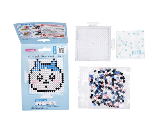 a set of materials for creating a pixel art design, including a package with instructions, a clear plastic container with colored beads, and a small square with a QR code.