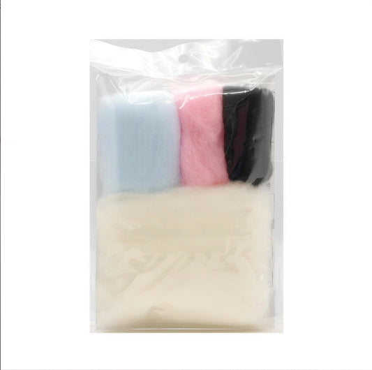 A package containing three different colored cotton balls, including blue, pink, and black.