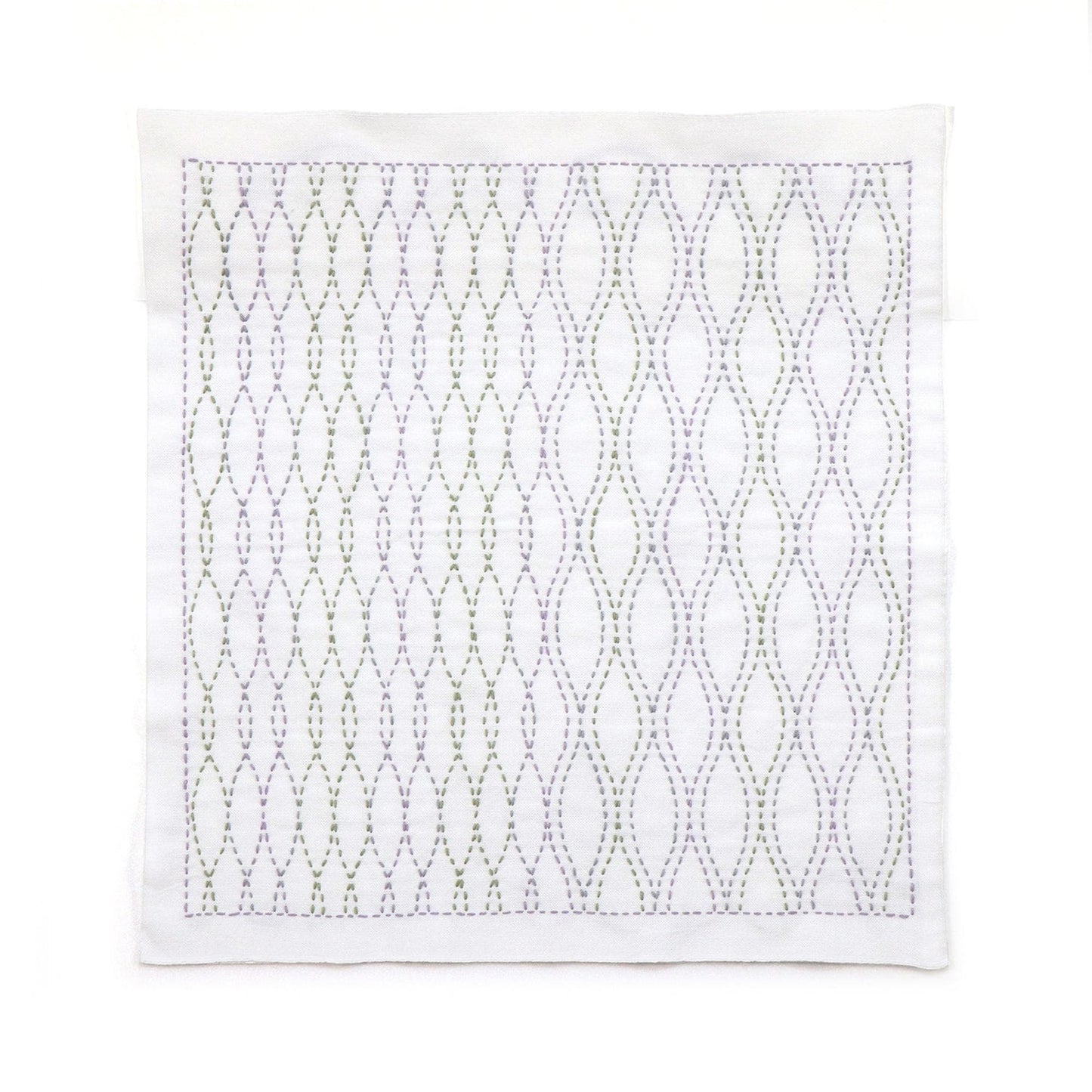 a square-shaped fabric with a repeating pattern of green and purple lines, creating a visually striking and intricate design.