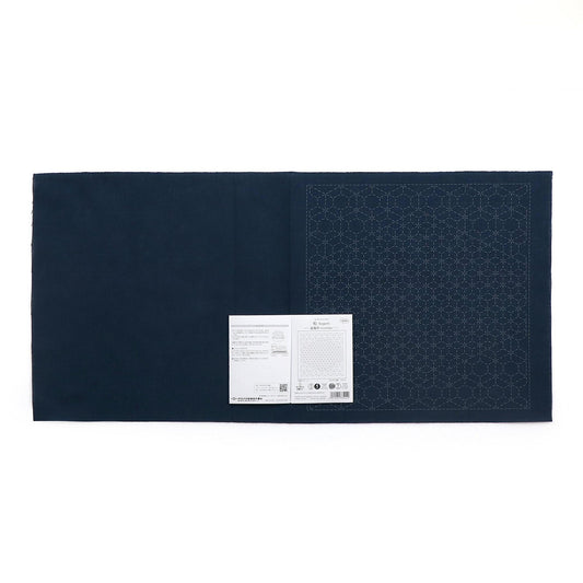 The image is a dark blue fabric with a white label attached to it.