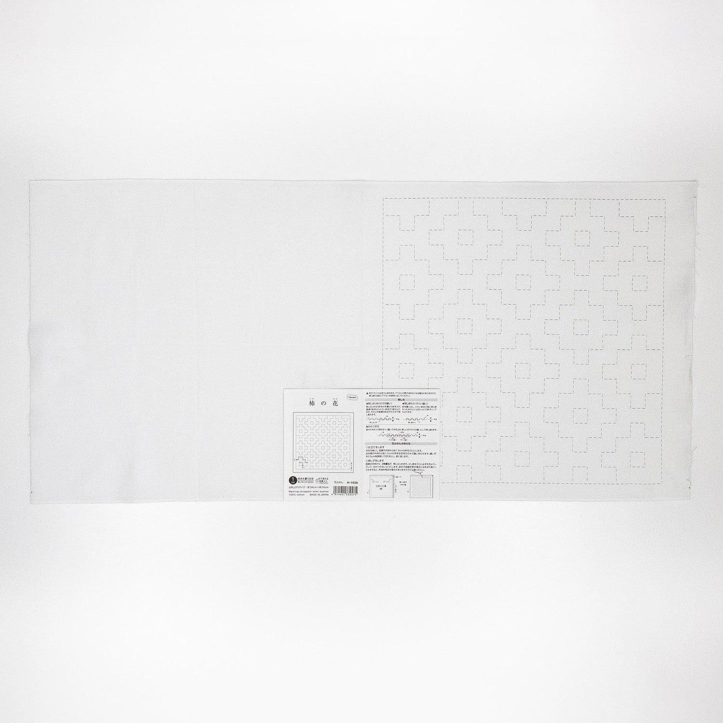 The image is a plain white sheet of paper with a grid pattern on it.