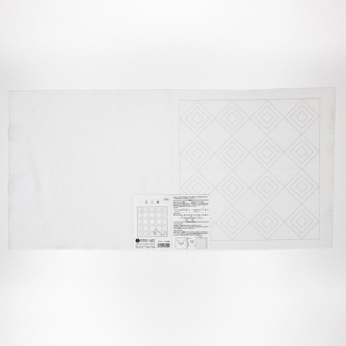 The image is a plain white sheet of paper with a grid pattern and some text printed on it.