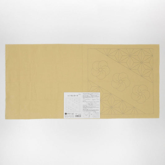 The image is a large piece of paper with a printed pattern or design on it, along with some text and a barcode.