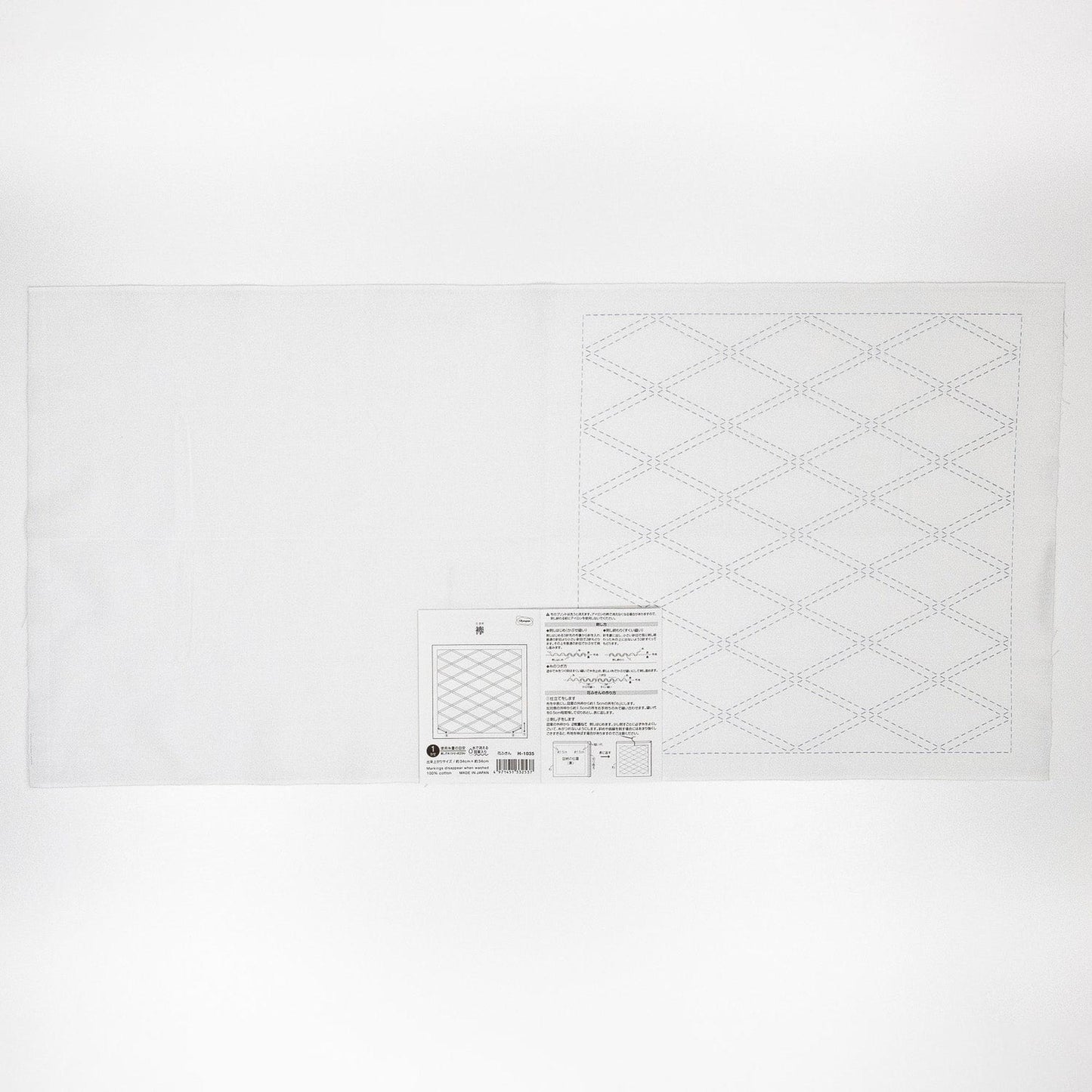 The image is a plain white sheet of paper with a grid pattern on it.
