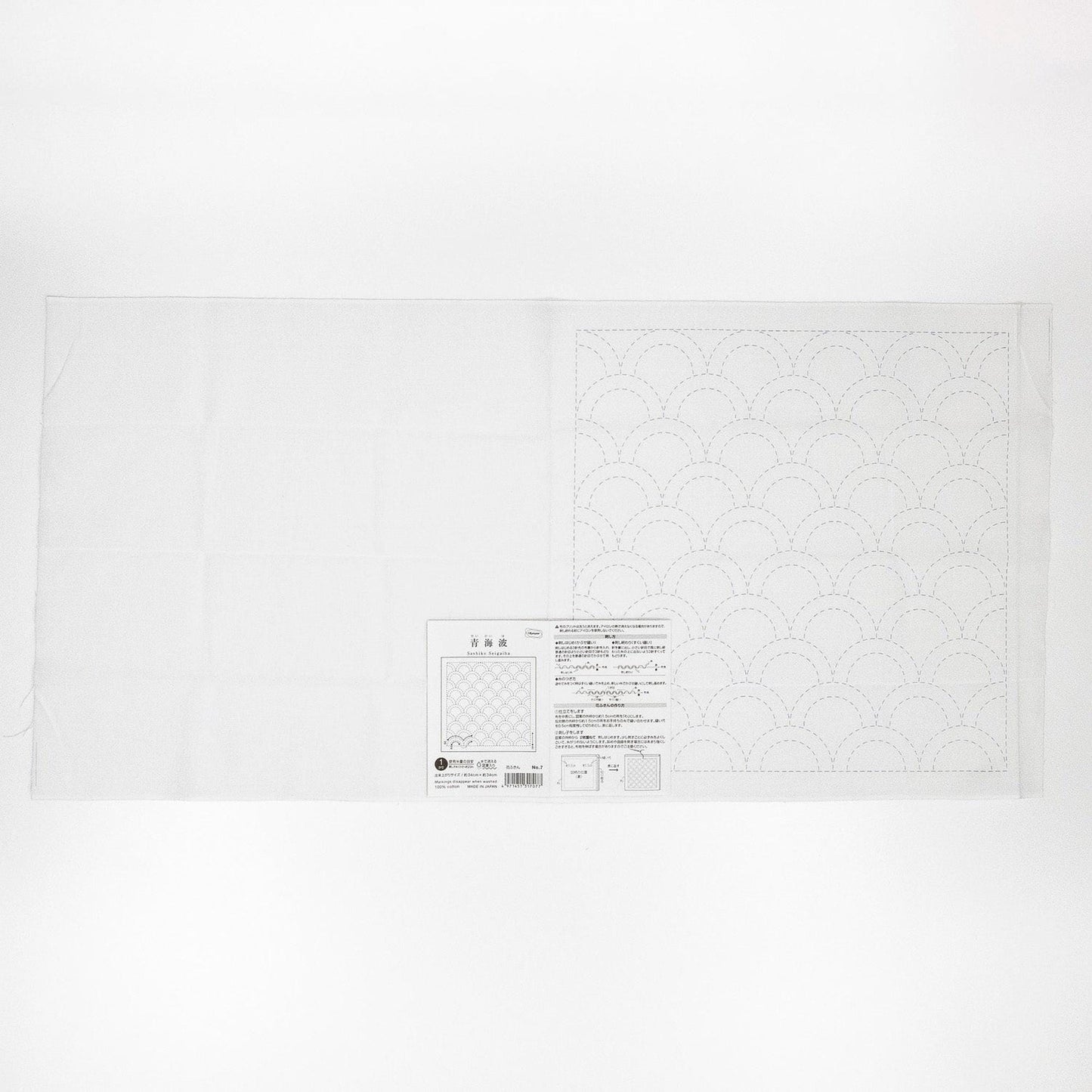 The image is a plain white sheet of paper with a pattern or design on it.