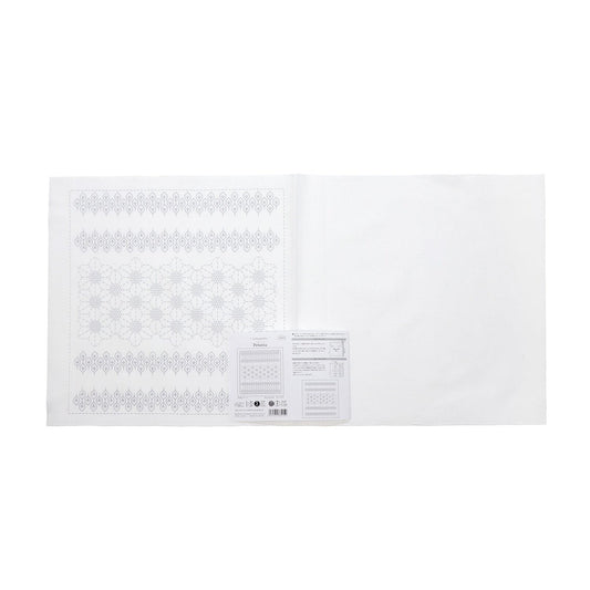The image is a white paper with a pattern of snowflakes on it.