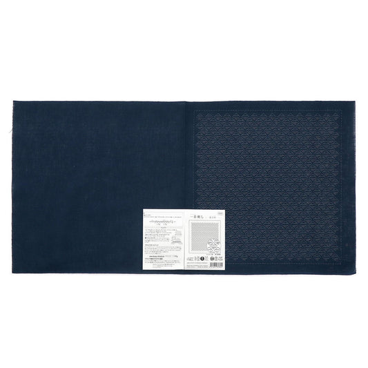 The image is a dark blue fabric with a white label attached to it, which appears to be a product label or instructions.