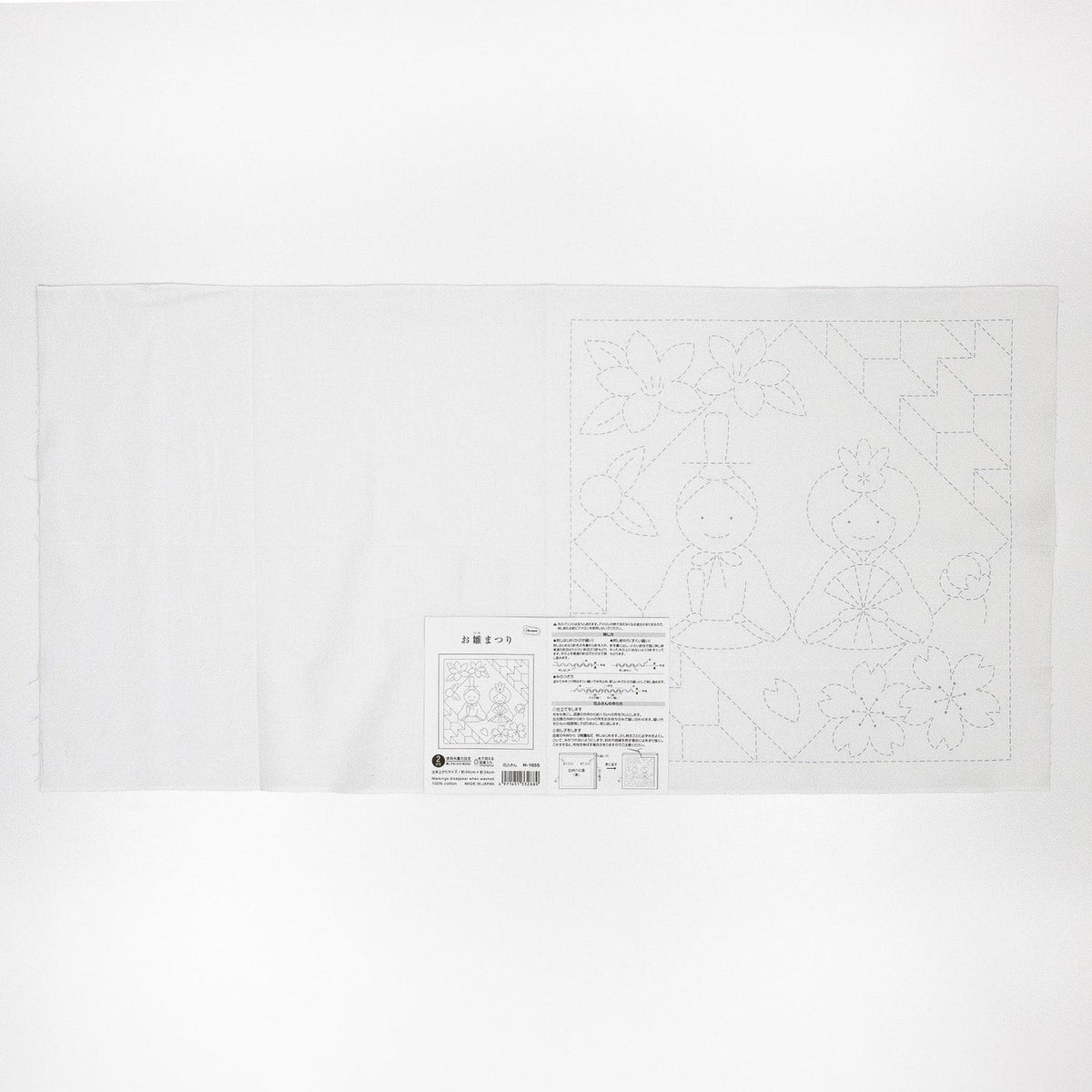 The image is a white sheet of paper with a black and white illustration of a floral pattern and some text.