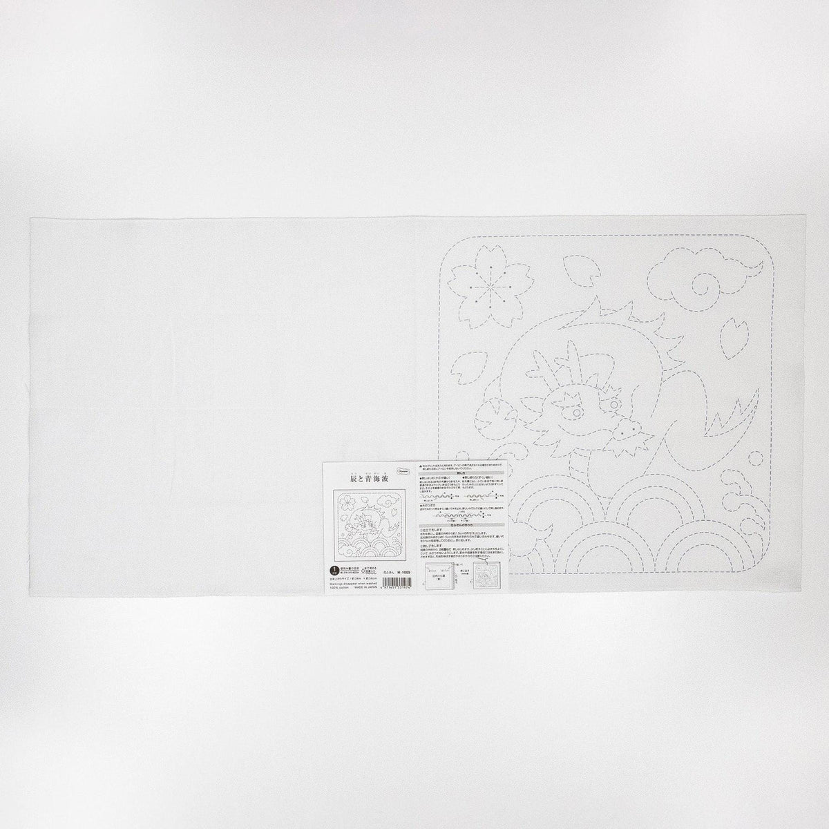 The image is a white sheet of paper with a black and white illustration of a flower and a dragon on it.