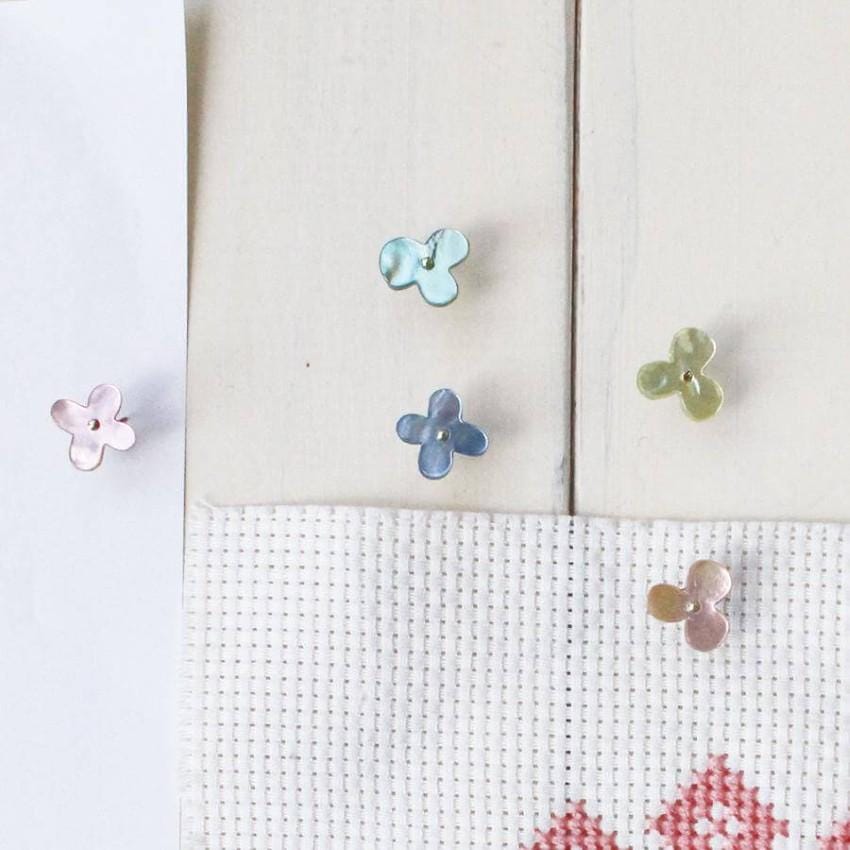 a close up of a piece of cloth with buttons on it