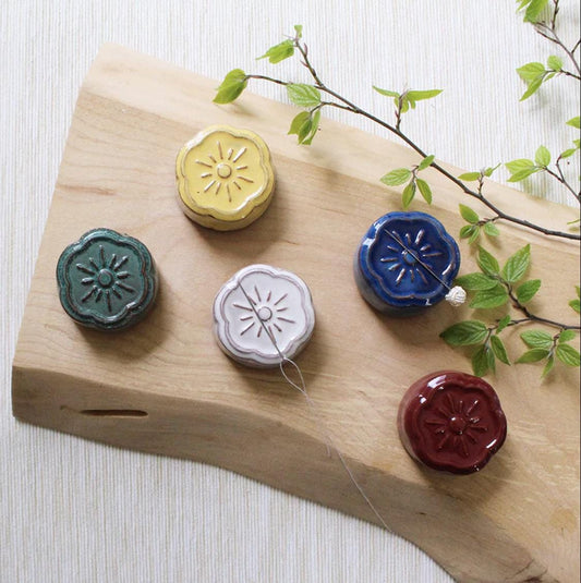 a wooden board with a bunch of buttons on it