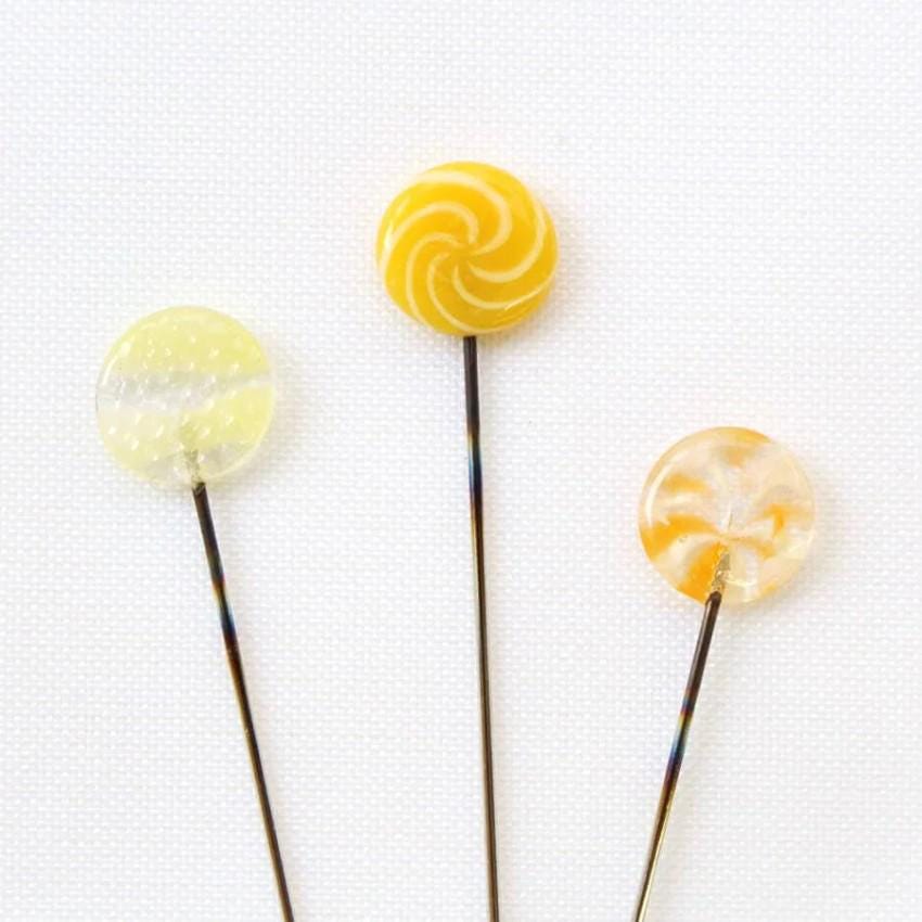 three lollipops sitting on top of each other