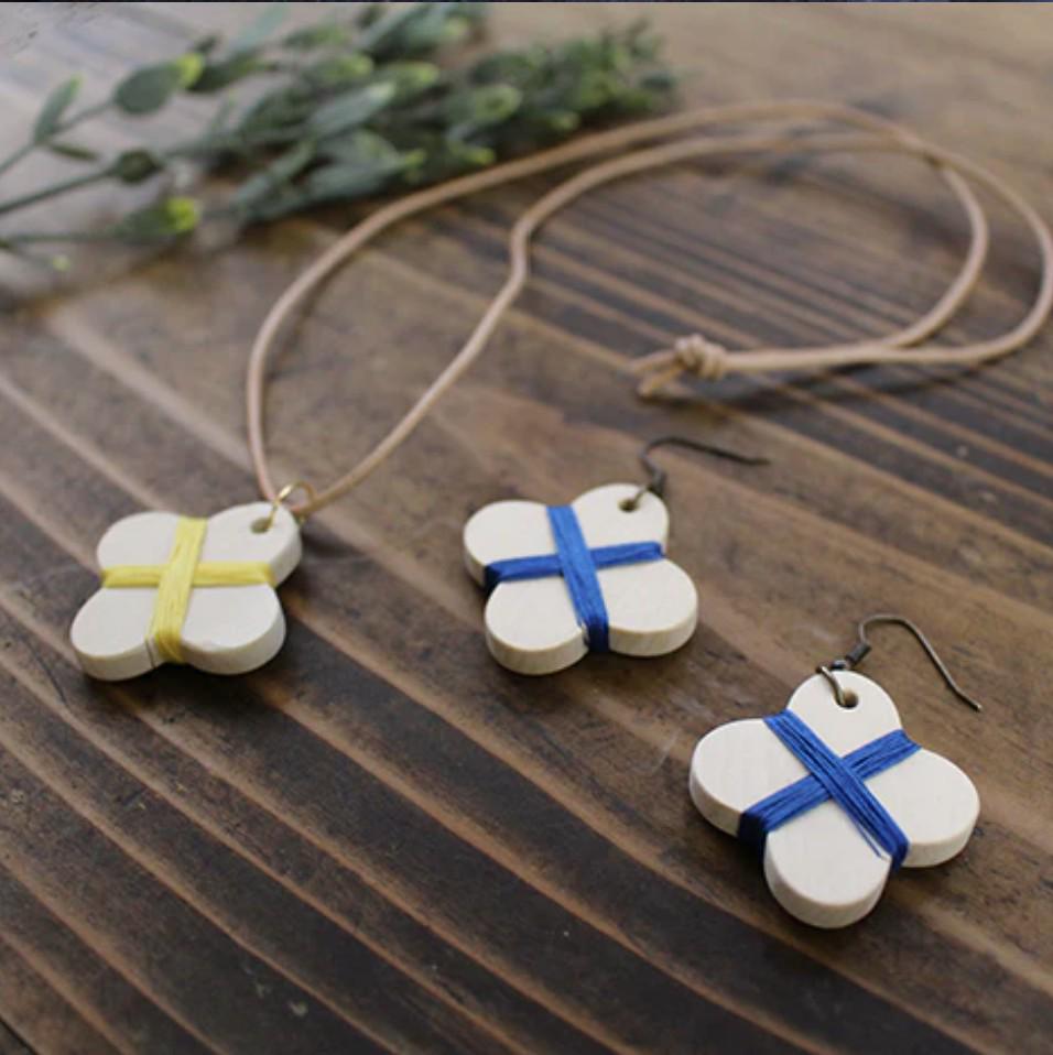 a couple of necklaces that are on a table