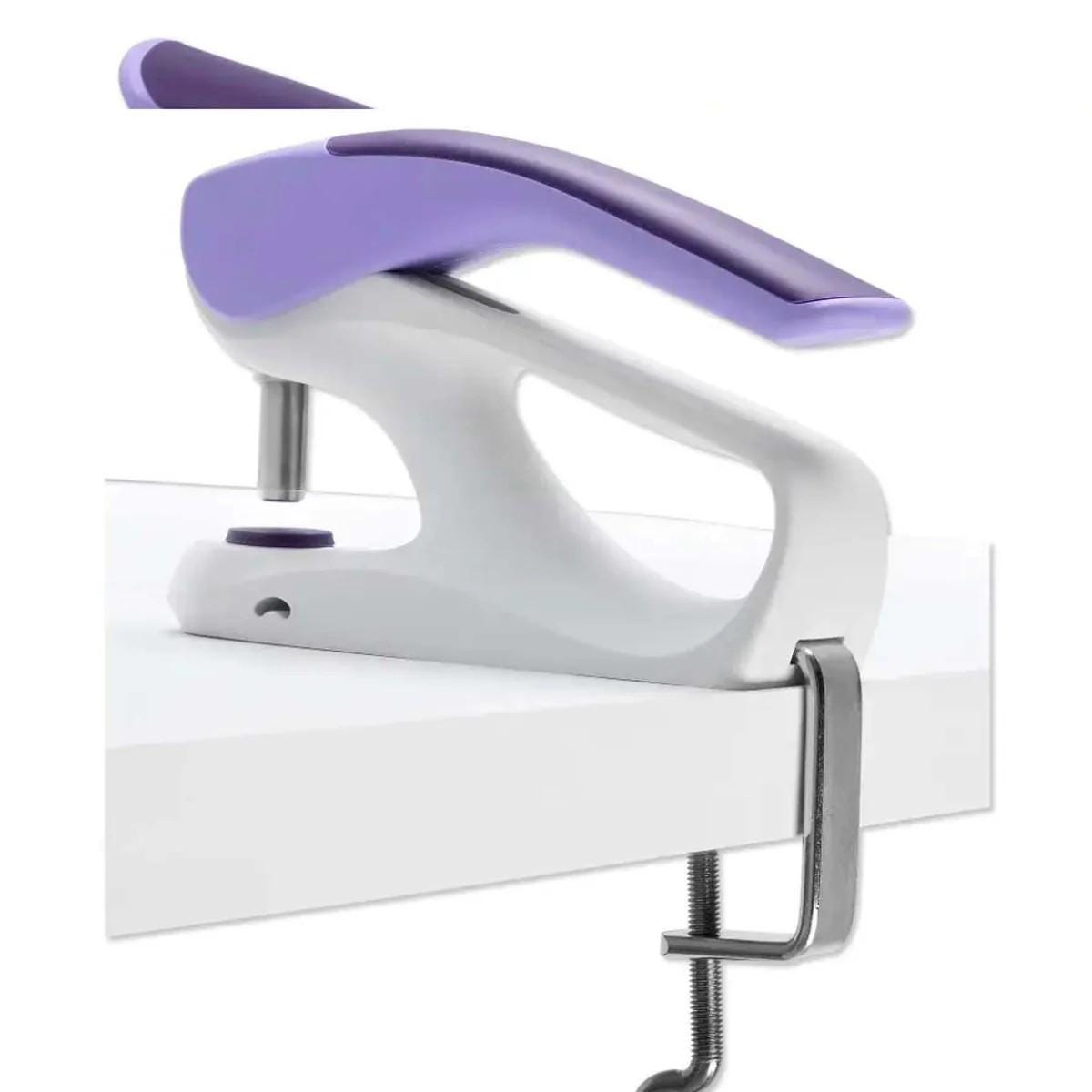 a purple and white iron on a white surface
