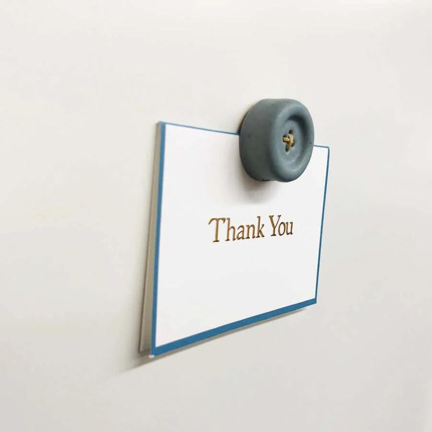 a thank you note attached to a refrigerator
