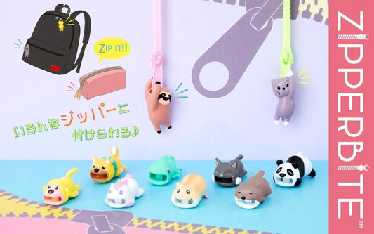 a group of small toy animals next to a wall