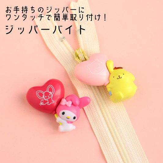 a couple of cute little items on a pink surface