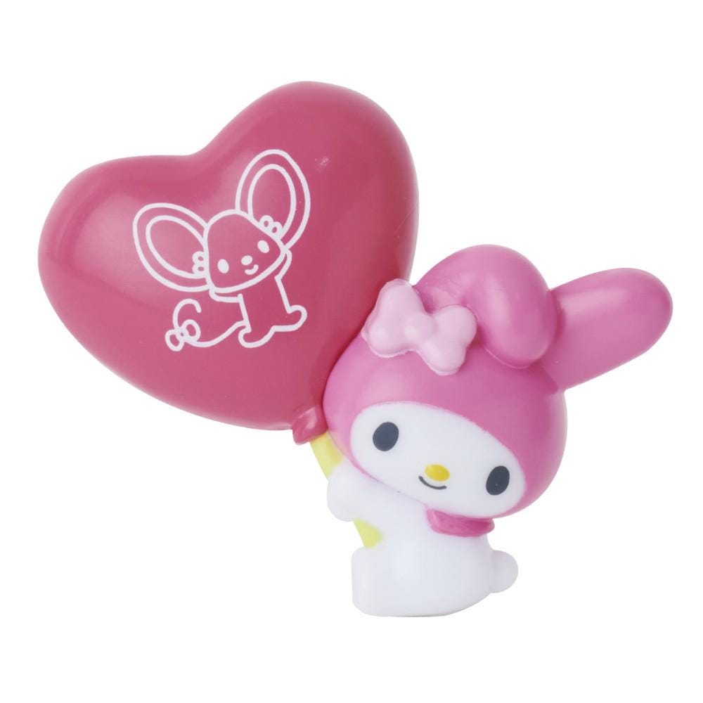 a hello kitty balloon with a heart shaped balloon