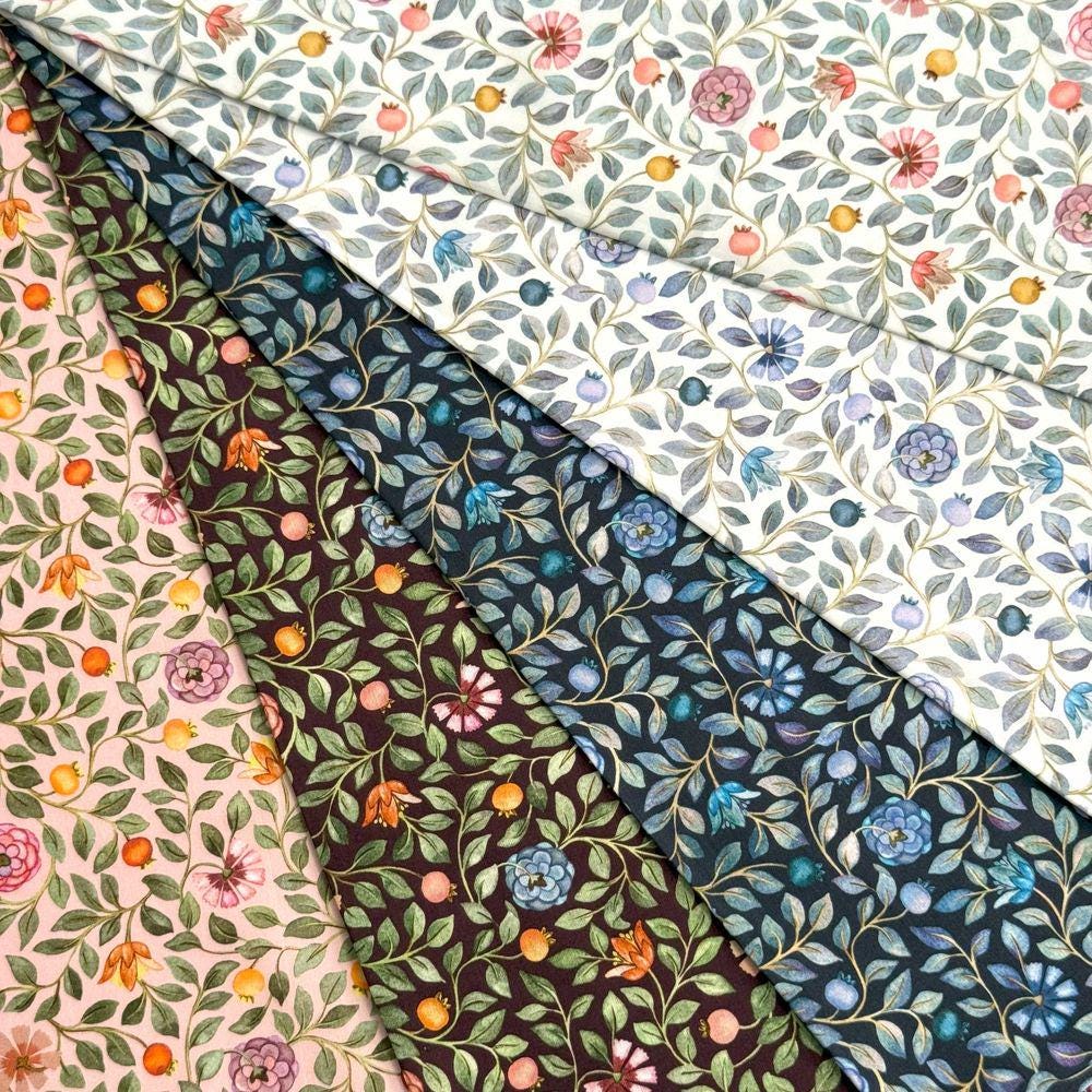 The image is a collage of four fabric swatches, each featuring a different floral pattern. The swatches include a white fabric with a floral pattern, a dark blue fabric with a floral pattern, a light pink fabric with a floral pattern, and a dark green fabric with a floral pattern.