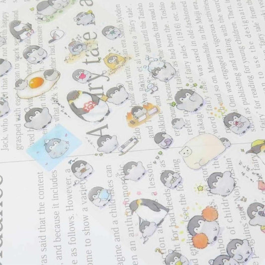 a collage of various cartoon penguin stickers on a page, with some text visible in the background.