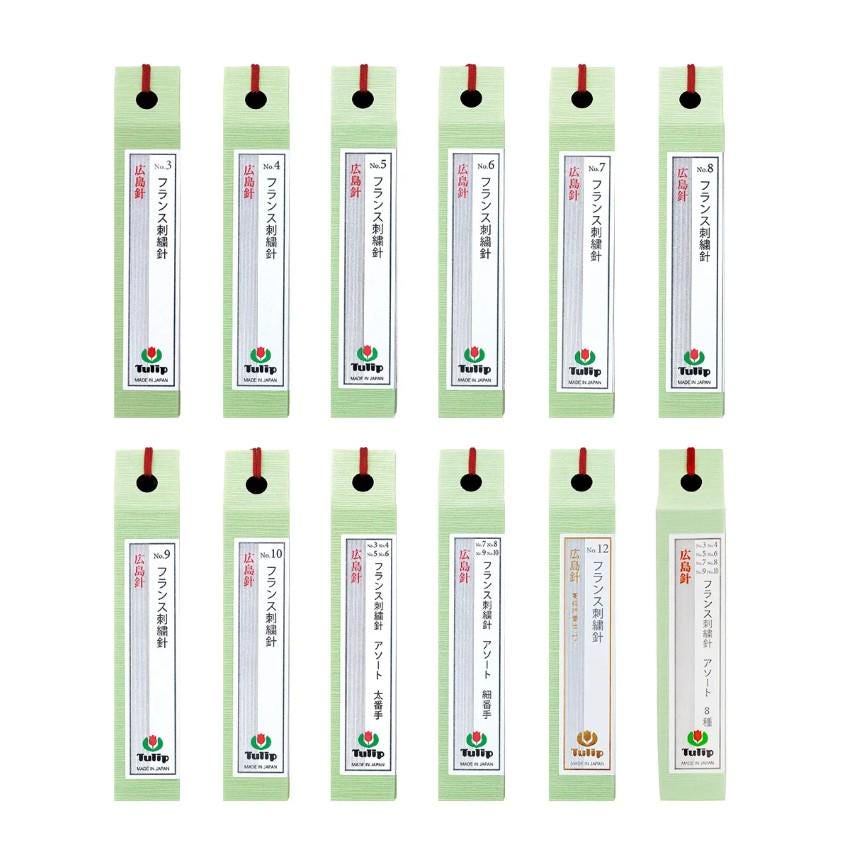 a collection of green and white pencil sharpener labels with red and black text, arranged in a grid pattern.