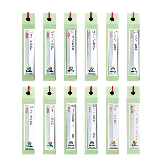 a collection of green and white pencil sharpener labels with red and black text, arranged in a grid pattern.