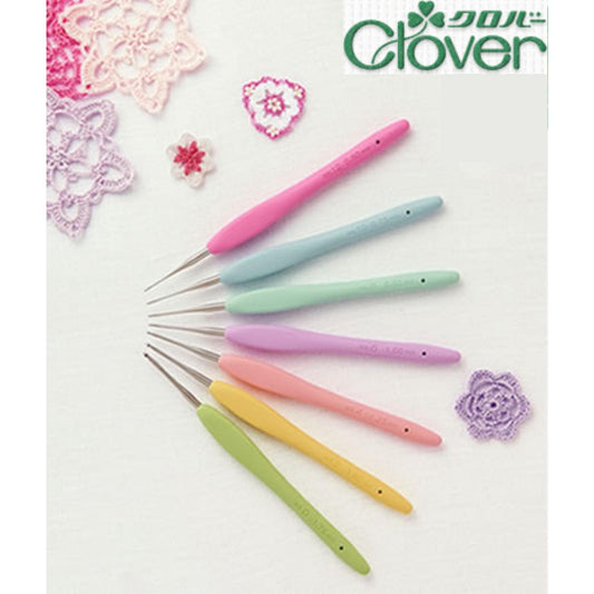 A collection of crochet hooks in various pastel colors, including pink, blue, green, and yellow, arranged on a white background.