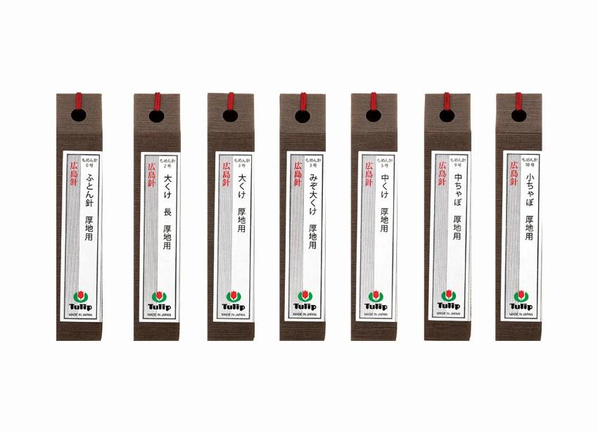 A row of brown and white boxes with red labels, each containing text in Japanese.